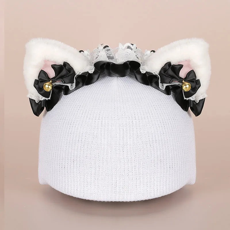 A plush fabric helmet cover with cartoon character ears, shown in size M for bicycle or motorbike use.