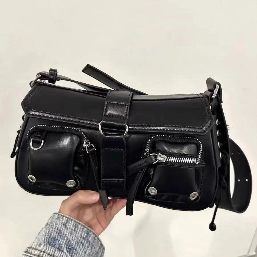Black structured PU leather women's baguette messenger bag with adjustable long shoulder strap.