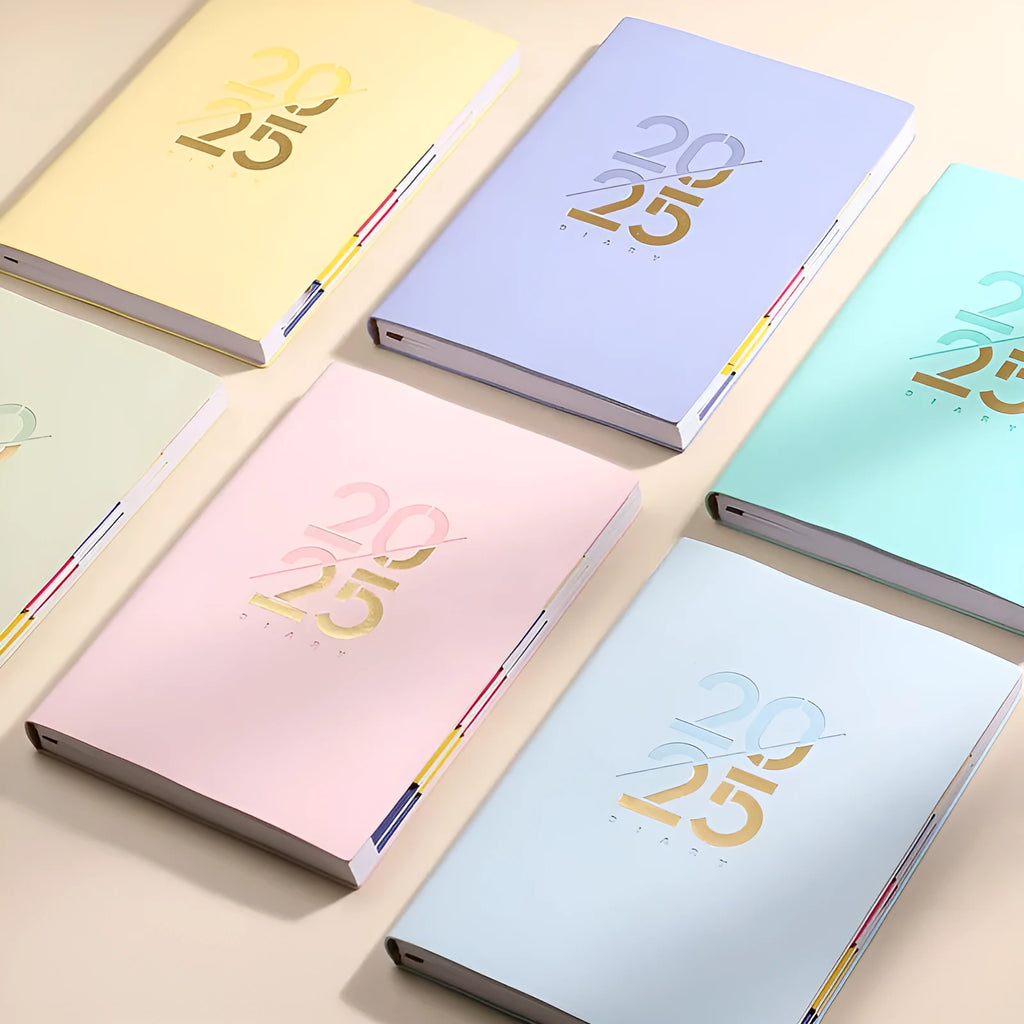 A5 daily planner with soft faux leather cover showing multiple colour options including pink yellow purple blue green