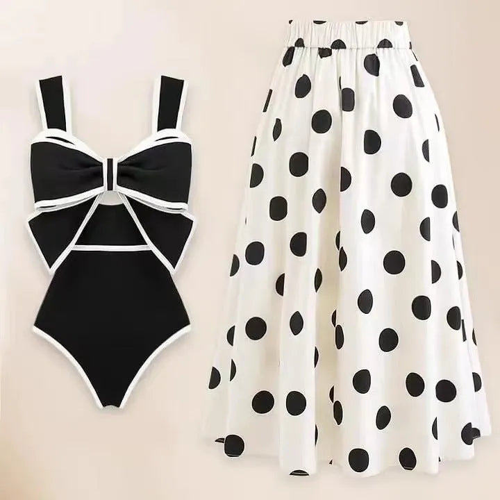 Women's one-piece swimsuit with beach dress style featuring bow detail and round skirt in polyester fabric