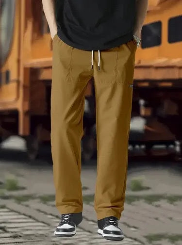 Men's polyester trousers for spring and autumn available in multiple colours and sizes