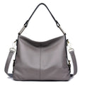 Genuine leather crossbody bag in vertical square shape with internal phone and document compartments