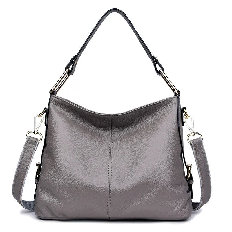 Genuine leather crossbody bag in vertical square shape with internal phone and document compartments