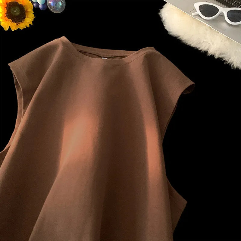 Men's loose solid colour cotton tank top on hanger showing straight hem design