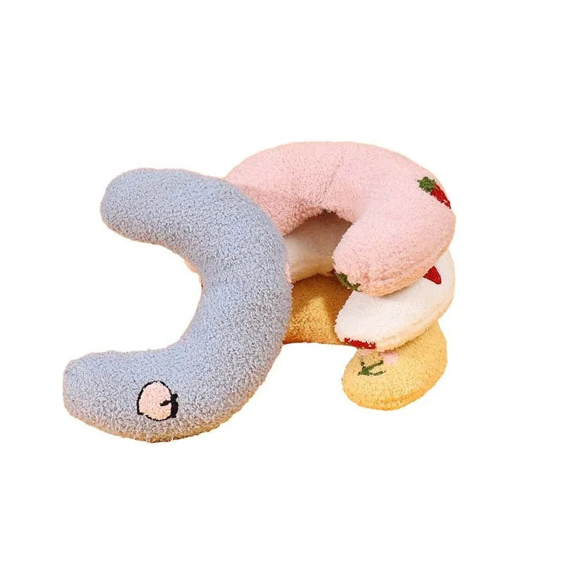 U-shaped half moon cloth pillow pet bed for cats in blue, pink, white, and yellow colours.