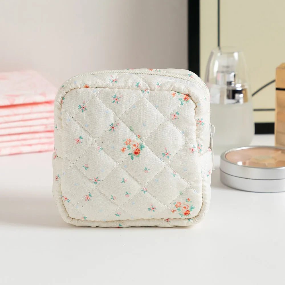 Breathable polyester key storage bag showing multiple floral and cherry pattern options including white background designs