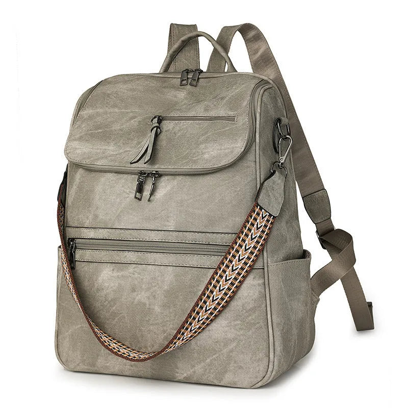 Retro college student backpack in PU leather with curved shoulder straps showing stitching detail