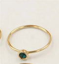Women's 14K gilded GF zircon knuckle ring shown in green, blue, dark red, and white on a sizing chart.