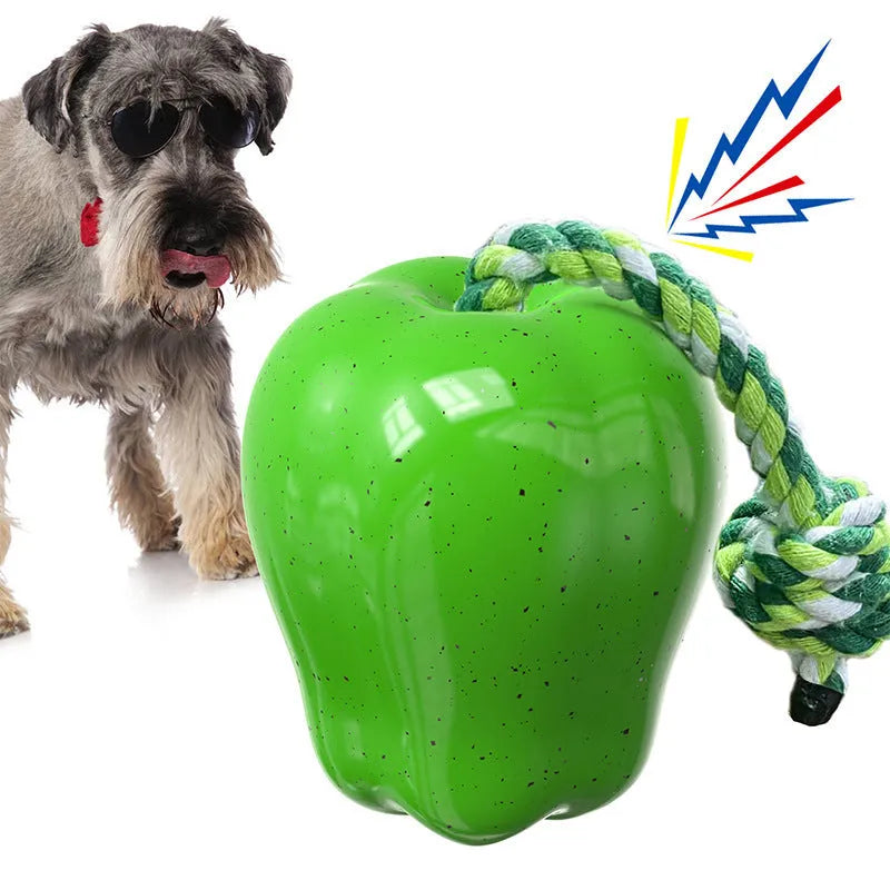 Plastic dog molar toy ball in green colour with squeaky design for outdoor play and dental stimulation