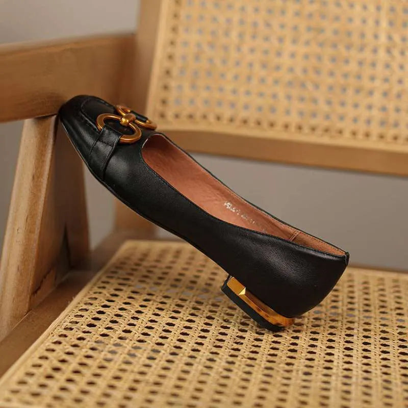 Wanwan Lei style women's pumps with shallow mouth design, square toe, and metallic flat shoe appearance