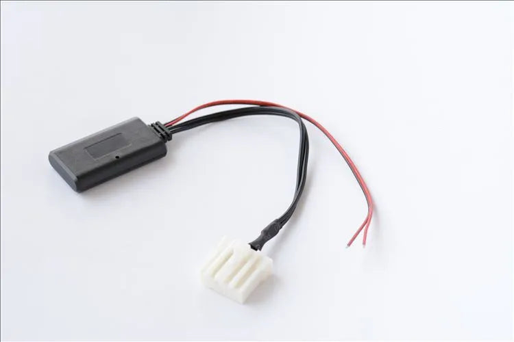 Black Mazda Bluetooth audio cable adapter for 2006 and newer 3, 6, M3, M6, MX5 models.