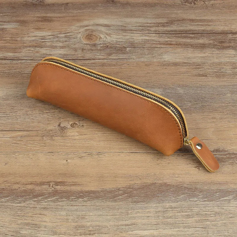 Handmade square leather pencil and glasses case with zipper, shown in black colour.