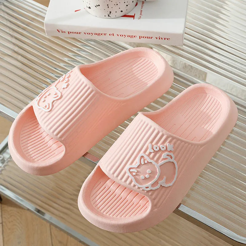 Green EVA cat flip-flop slippers with a thick platform sole on a white background.