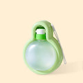 Green portable dog water bottle with integrated drinking bowl for outdoor travel and activities