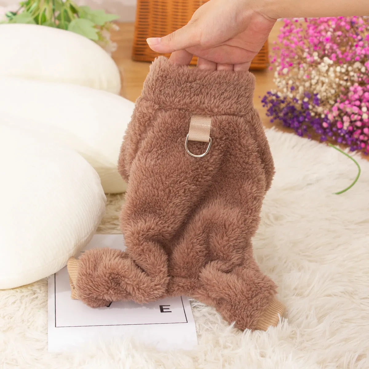Blue double-sided plush dog clothing with high collar and towing ring on model dog