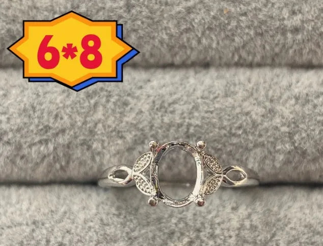 Oval denier ring with 6*8 mm stone in electroplated copper featuring Korean style five-pointed star design