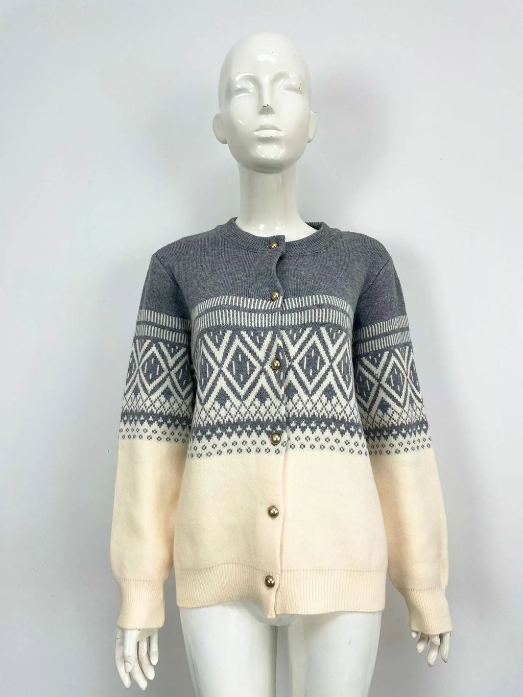 Women's grey alpaca wool cardigan with long sleeves and a red diamond contrast knit pattern.
