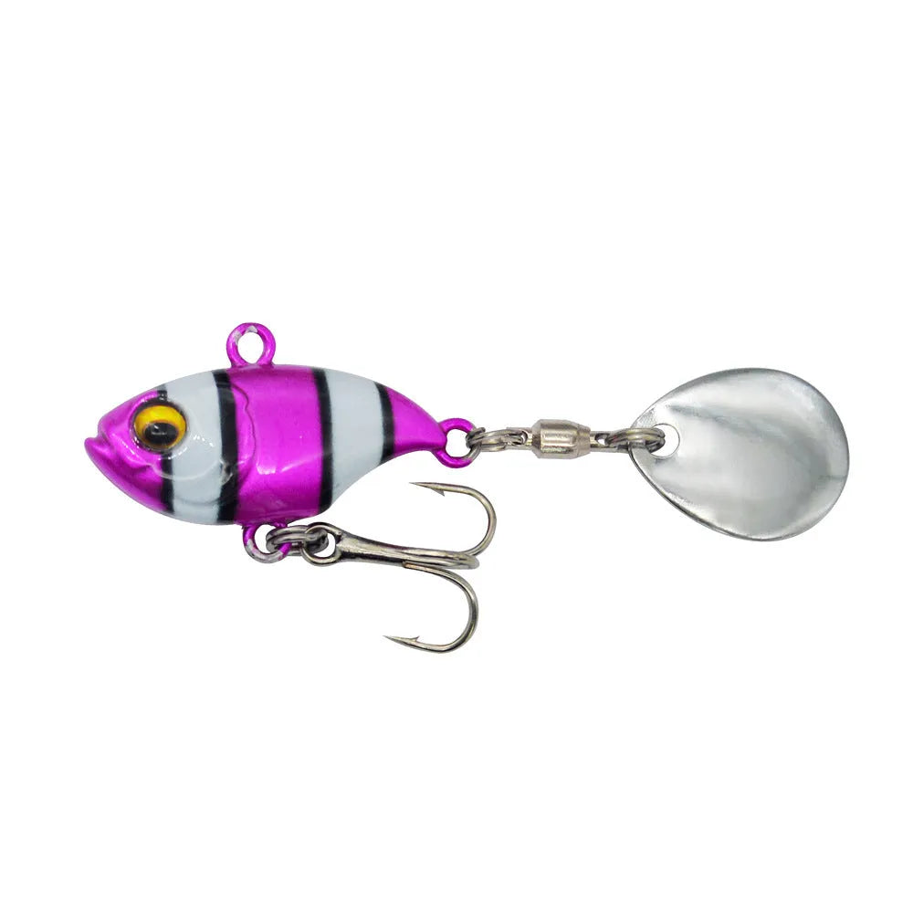 Metal sea fishing lure with rotating sequin in gold colour option