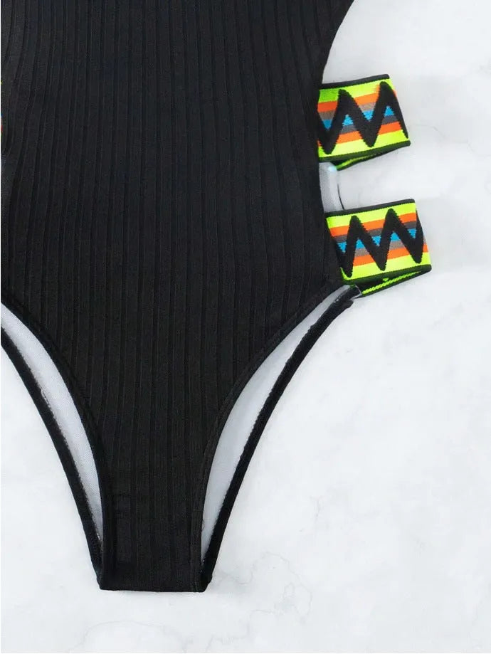 Women's black and orange solid colour one-piece swimsuit in polyester fabric