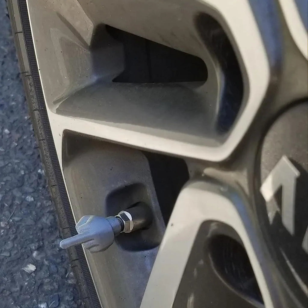Four latex car tyre valve dust caps shown in black and skin colour options