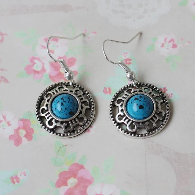 Handmade Miao silver turquoise earrings with geometric flower disk design and ethnic patterns in choice of colours