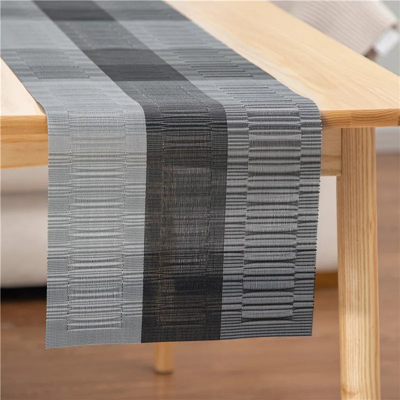 PVC non-slip dish mat in gradient bamboo design protecting kitchen worktop with dishes