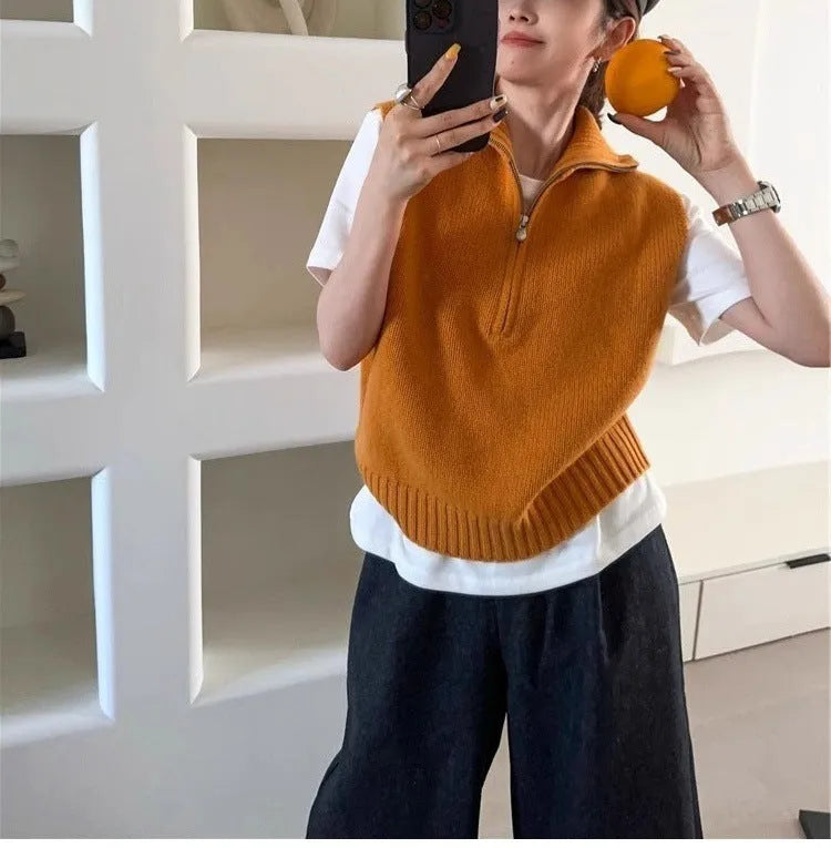 Retro half-zip sleeveless knit vest in mesh polyester fabric shown in a solid colour