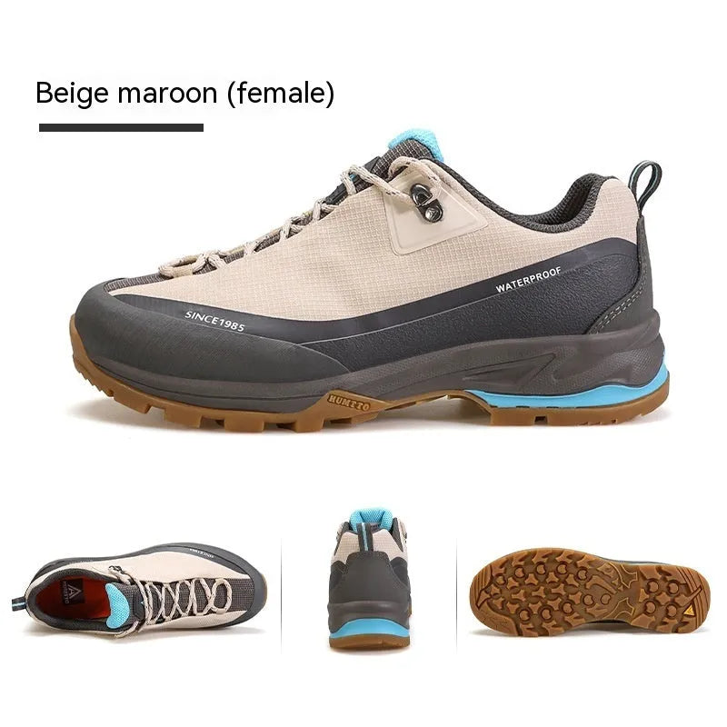 Men's low-top mountain climbing hiking boots with rubber outsole and lace-up front