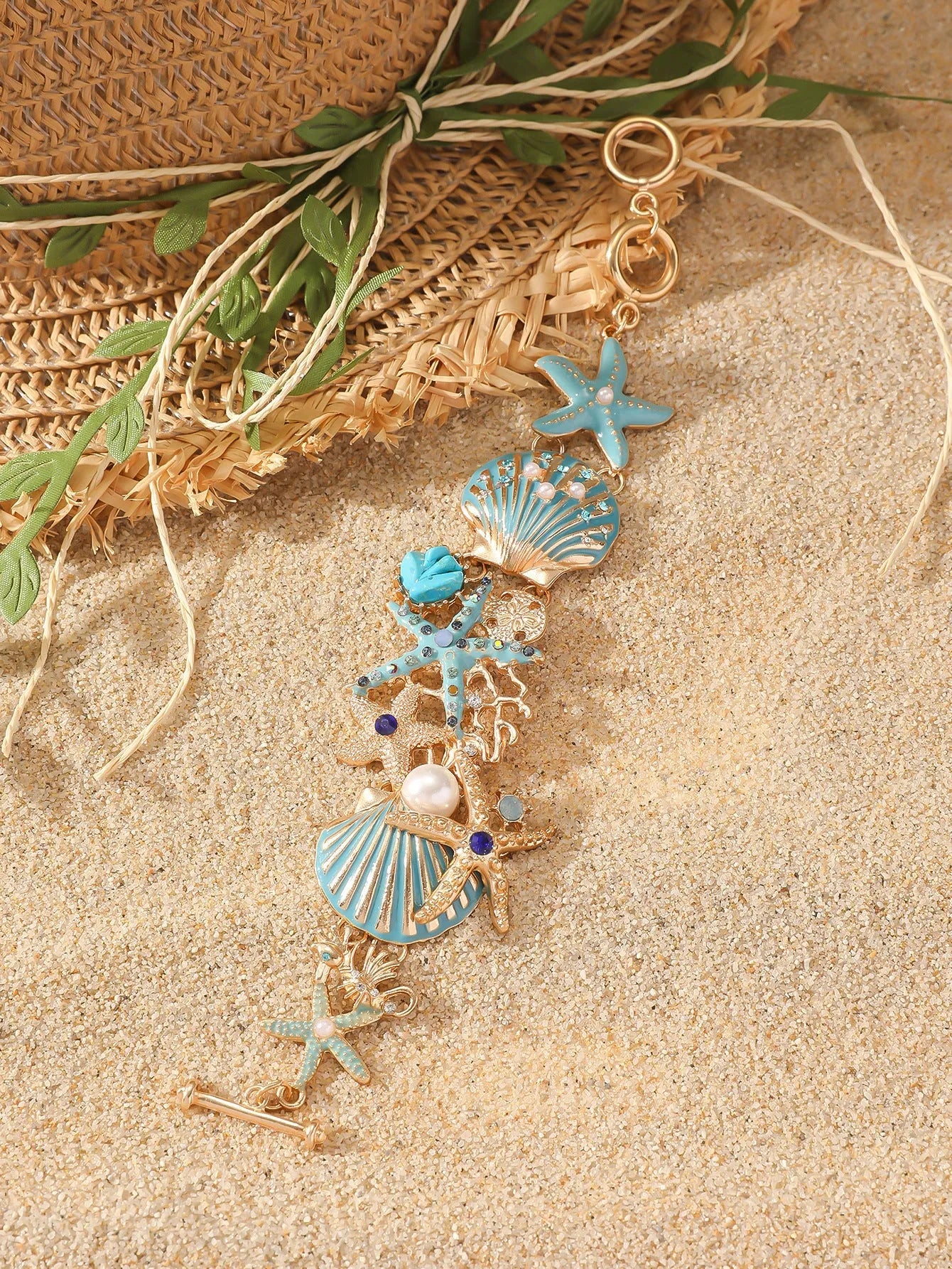 Women's marine boat anchor and starfish alloy bracelet in turquoise, coral red or coral blue colour