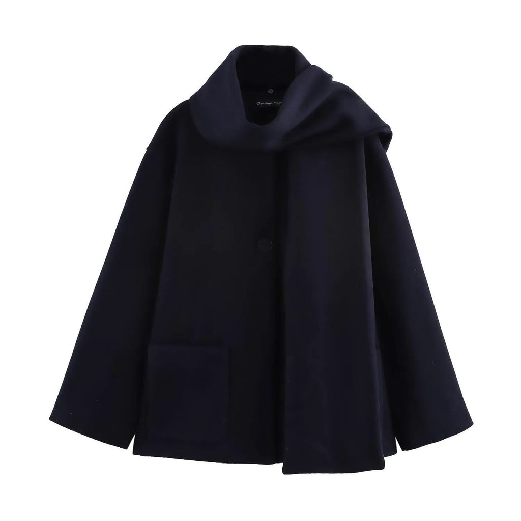 Women's long black polyester overcoat with artificial fur collar, shown at full length.