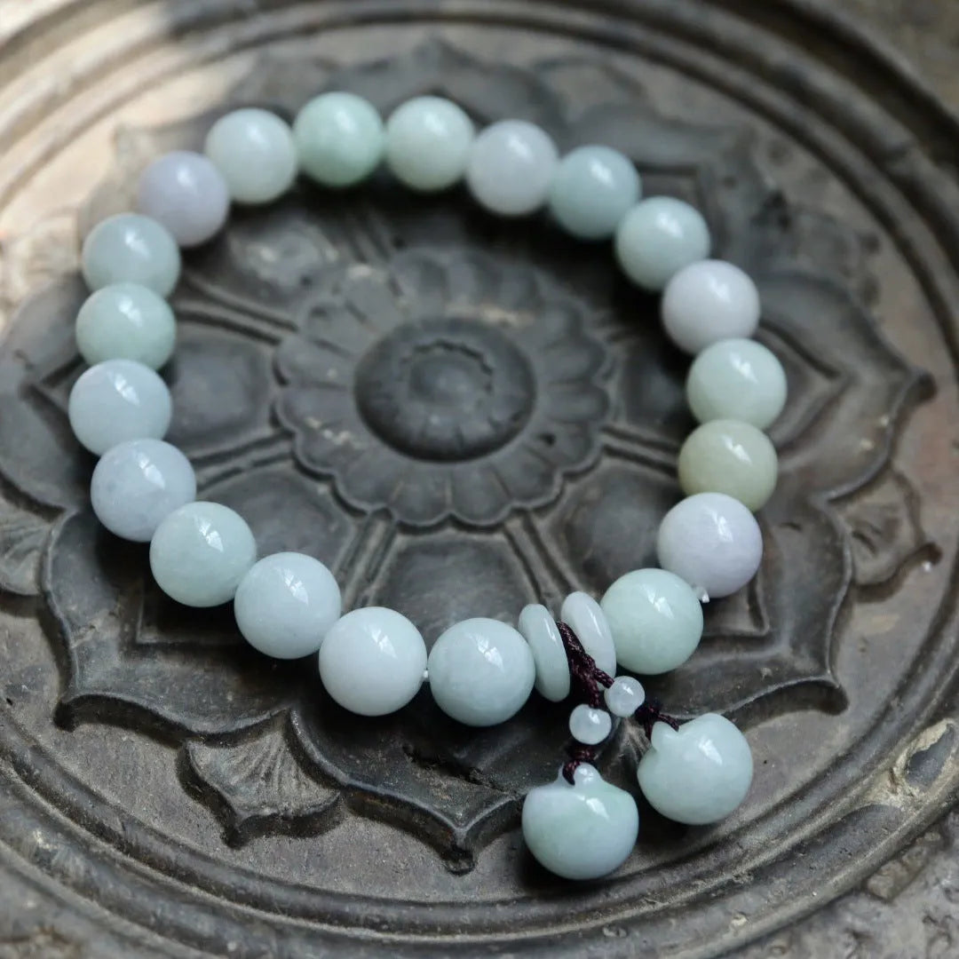 Adjustable natural jade bracelet with geometric pendant and symbolic apple, Maitreya, gourd, and money bag charms.