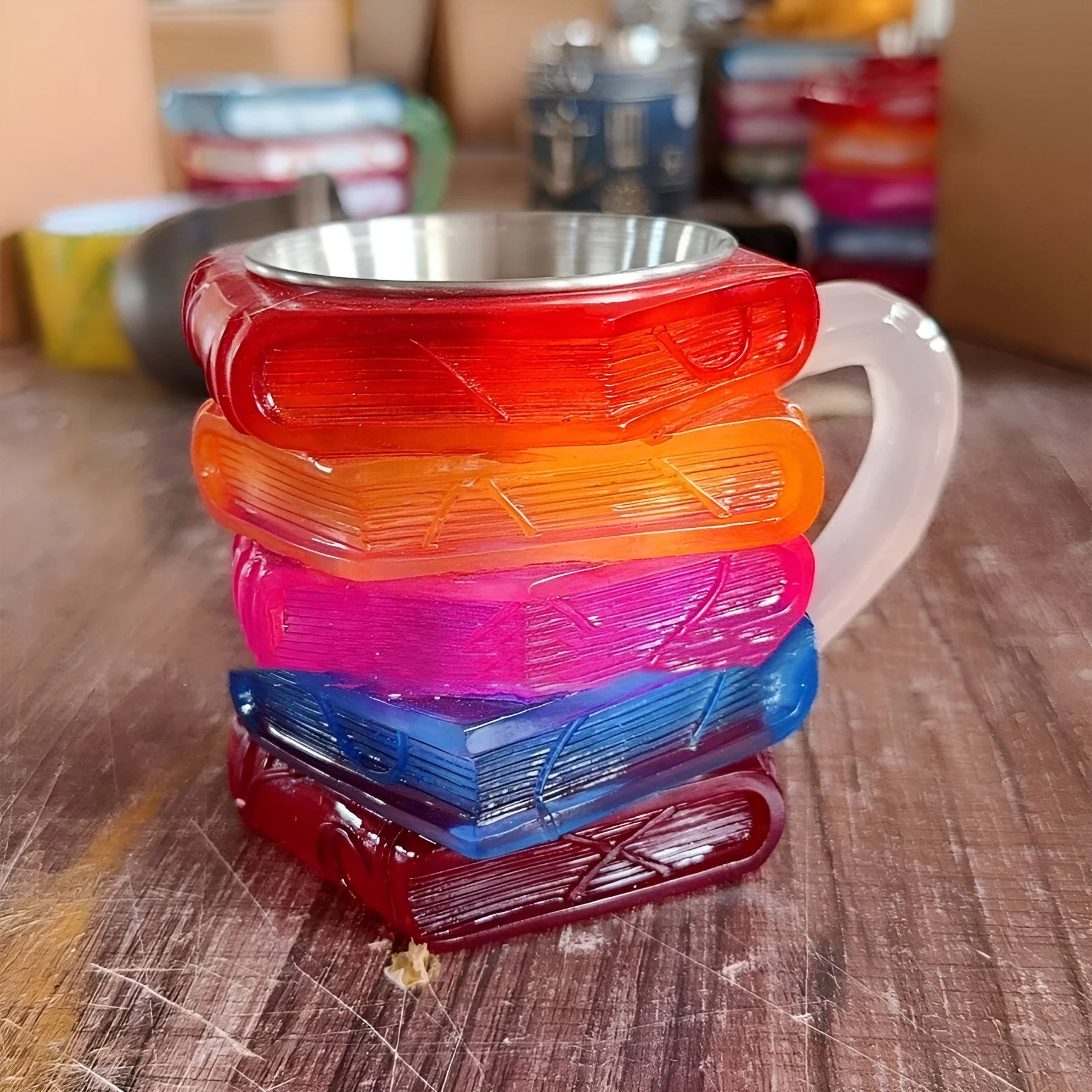 Painted synthetic resin decorative coffee cup in American style library or pattern design measuring 13x10x10cm