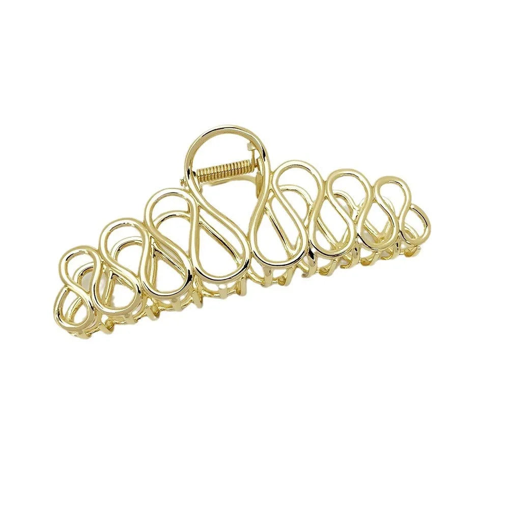 Large gold or silver electroplated alloy hair clip with tassel detail for thick hair updos