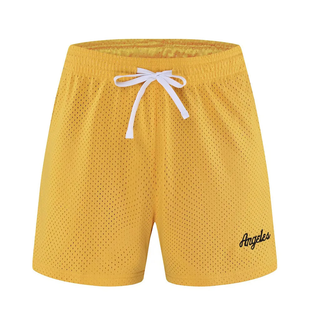 Men's black double-layer mesh shorts laid flat, showing sports and leisure style.