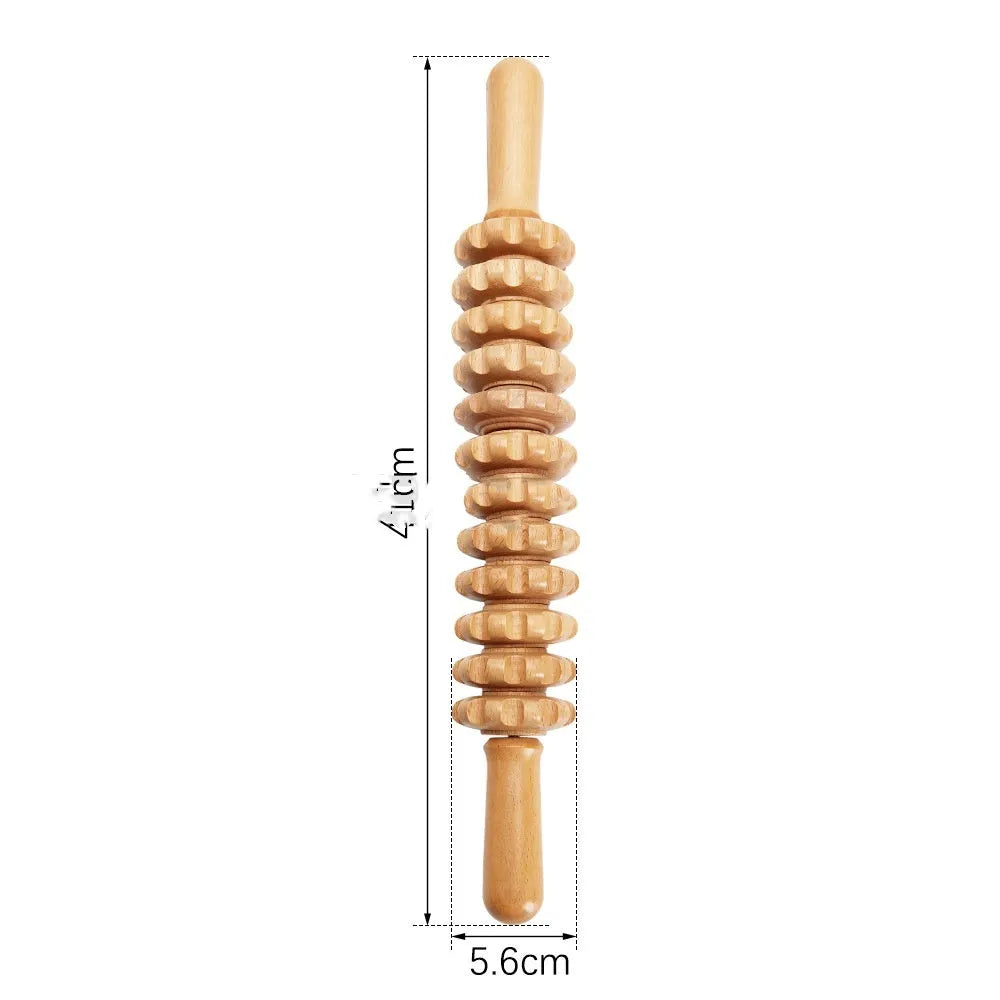 A selection of natural beechwood massage rollers including T-shaped and multi-wheel designs on a wooden surface.
