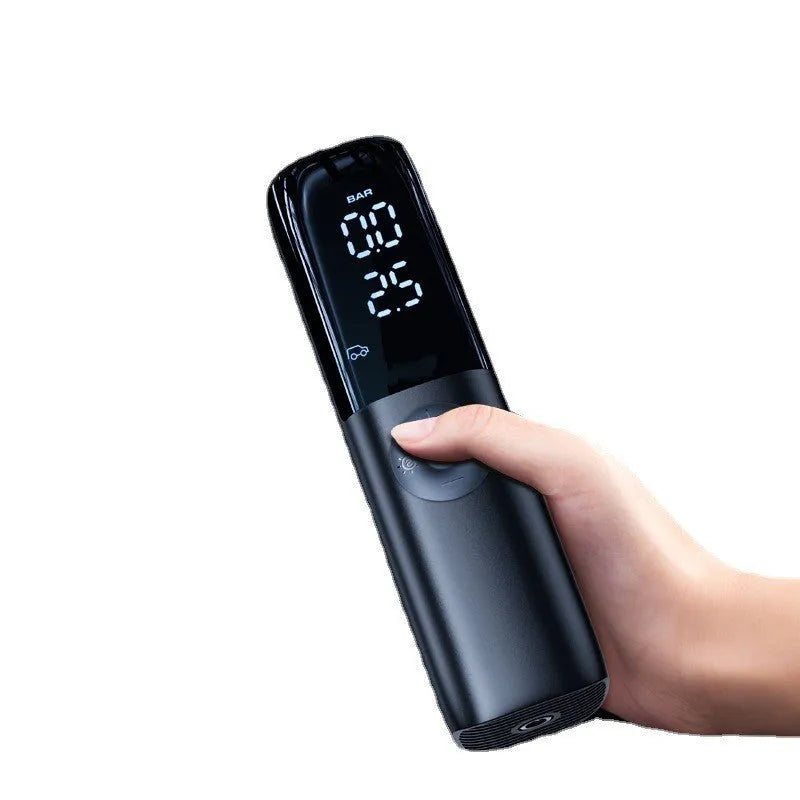 Black portable car tyre air pump with pressure gauge display and plug-in cable