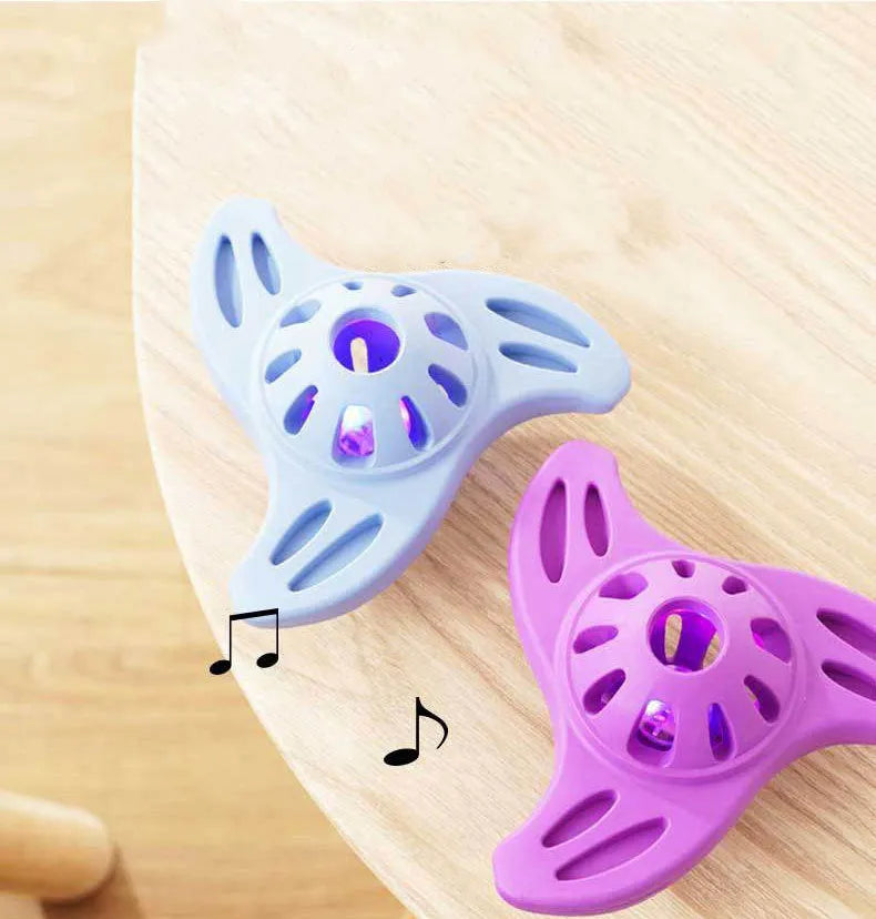Blue bite-resistant boomerang-shaped dog toy with molar texture on a white background.