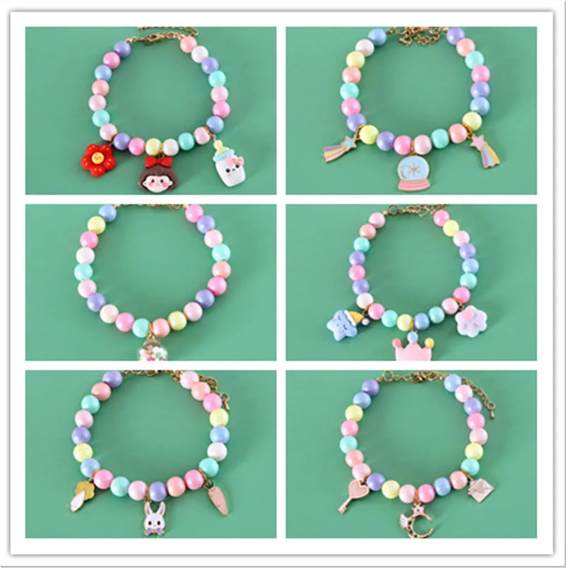 Pastel macaron charm pet collar with moon and rabbit designs on adjustable resin band for cats and dogs