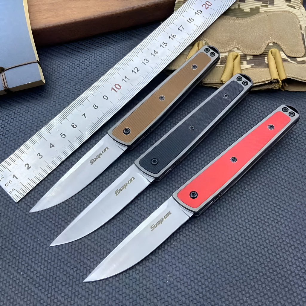Folding fruit knife with stainless steel blade in black, red or coffee colour options, shown open to 17cm total length