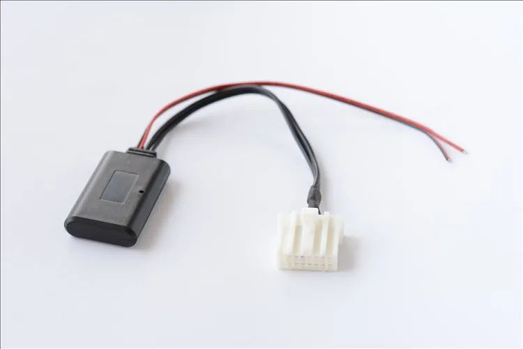 Black Mazda Bluetooth audio cable adapter for 2006 and newer 3, 6, M3, M6, MX5 models.