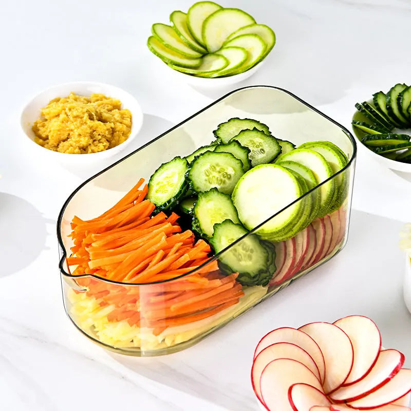 Transparent green vegetable cutter with stainless steel blades and 1.5L container