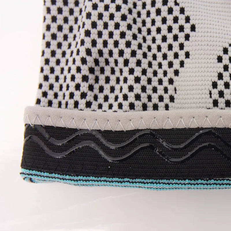 Sky blue silicone basketball knee pads with elastic fibre construction shown in knee sleeve design