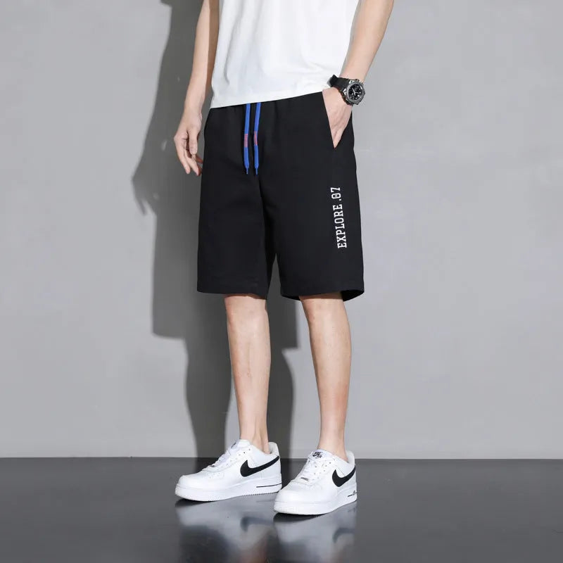 Boys' loose-fit cotton shorts in black, available in plus sizes for summer comfort.