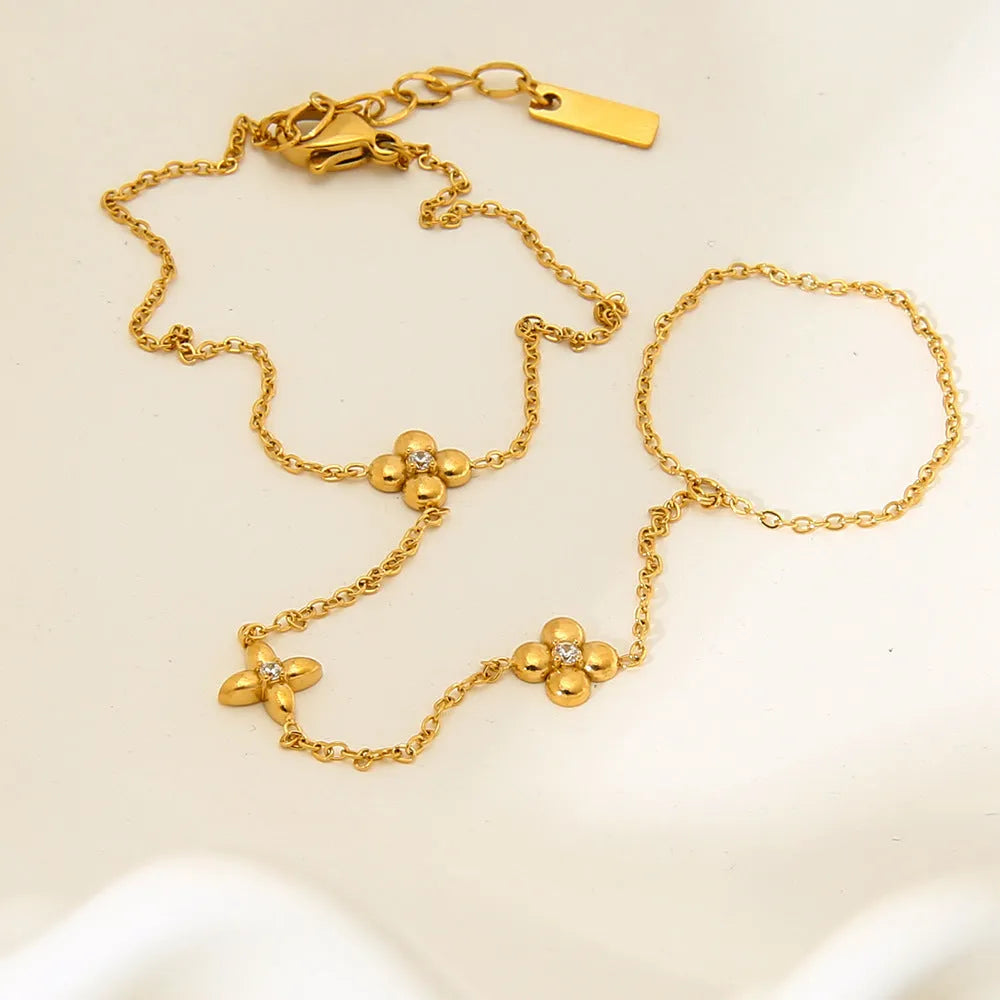 Women's stainless steel bracelet with geometric eight-pointed stars and floral design in NXB048 gold colour