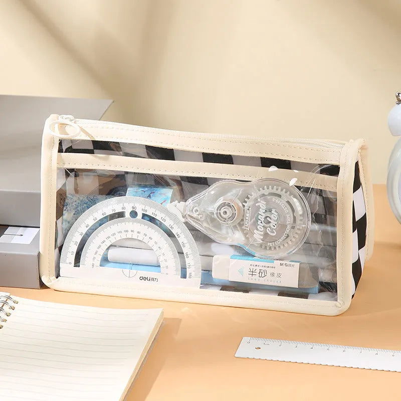 Transparent PVC pencil case with chessboard pattern showing pens inside, black and white grid design