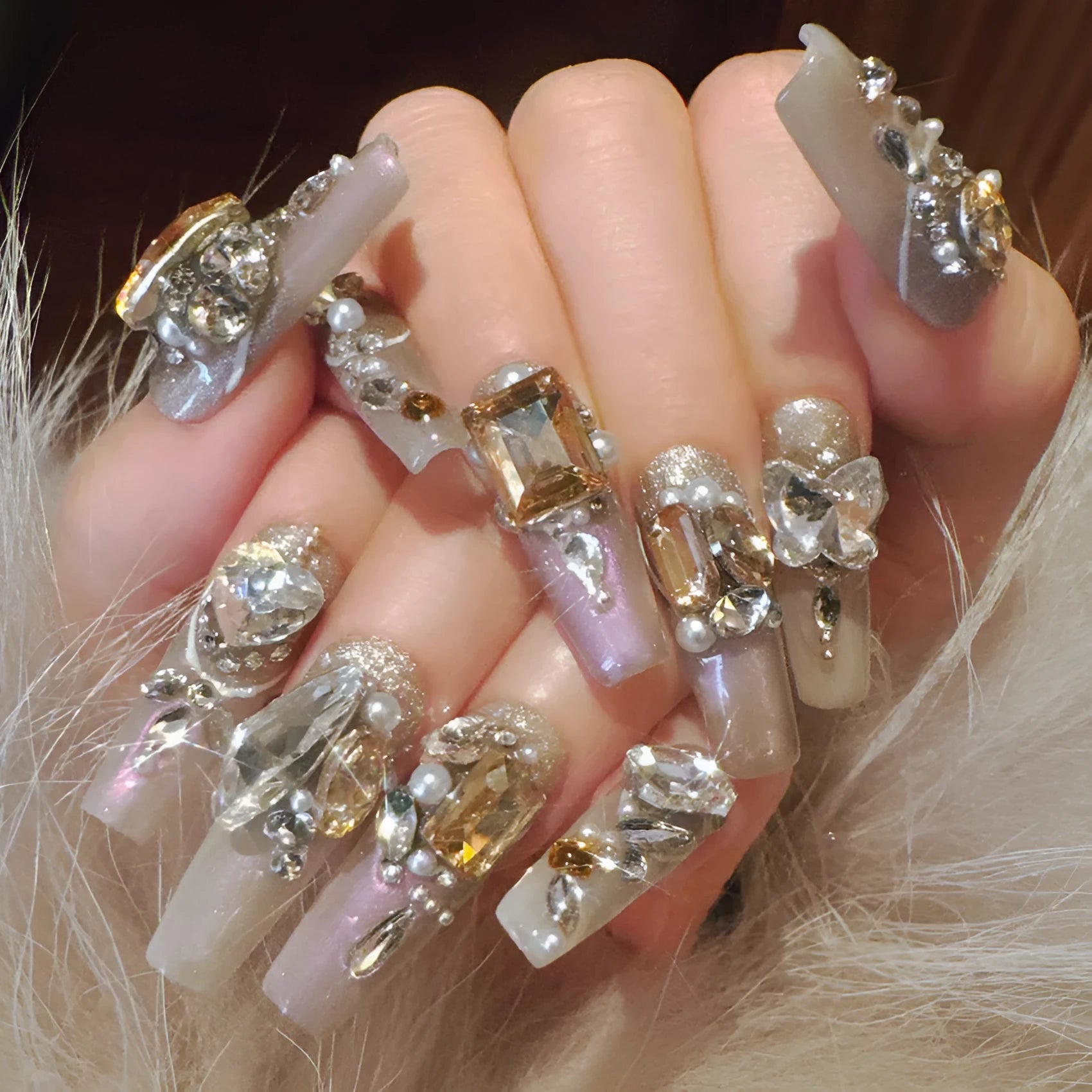 False nail patches with rhinestone decoration on card paper packaging with application tools
