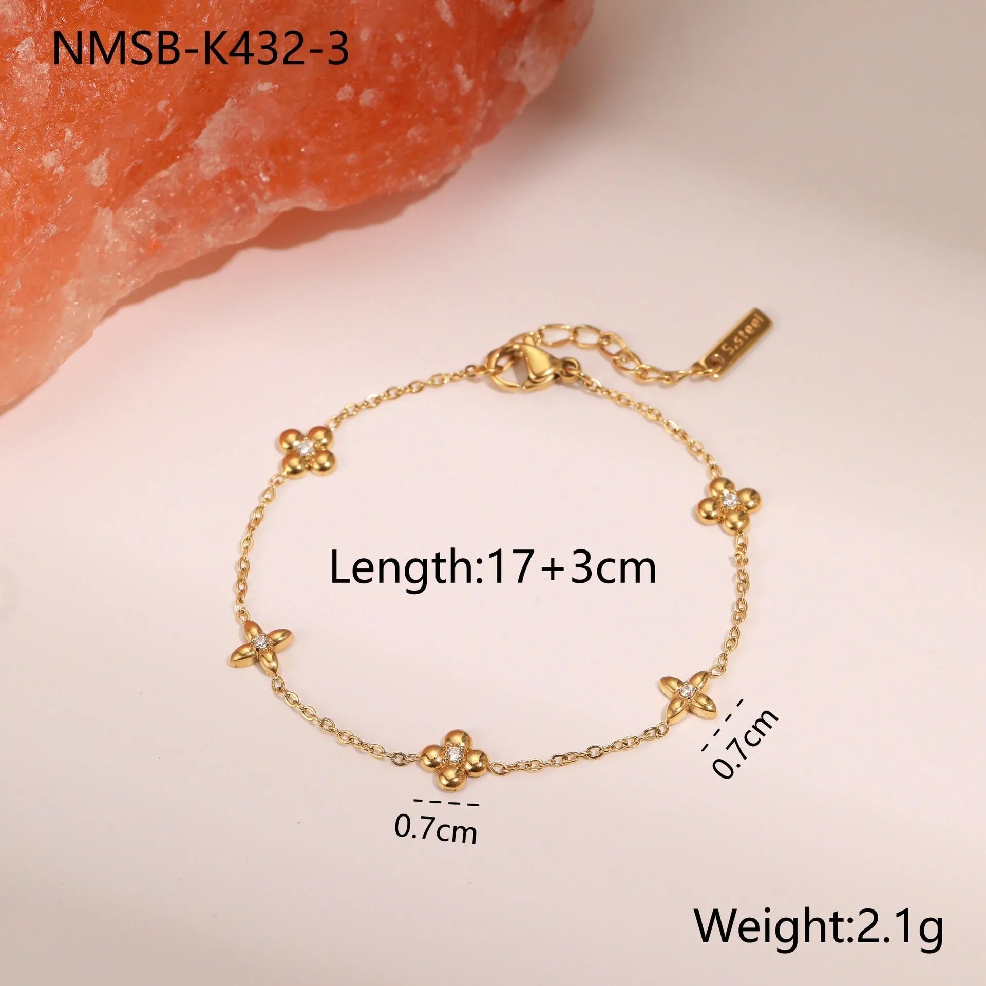 Ins Titanium Steel women's bracelet with 18K gold plating and a geometric zircon star pendant.