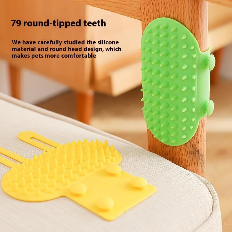 Silicone cat grooming comb with adjustable strap fastened to a table leg for self-cleaning