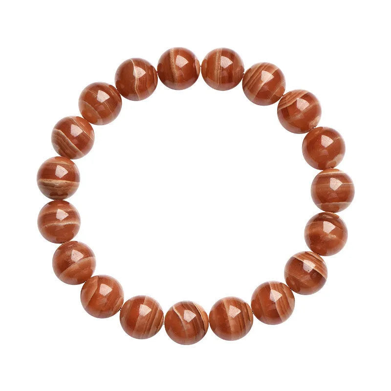 Natural rhodochrosite bracelet with round beads in old mine colour from Peru