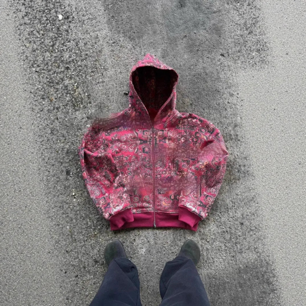 Man wearing a loose-fit blue hooded zip-up polyester coat for casual autumn wear.